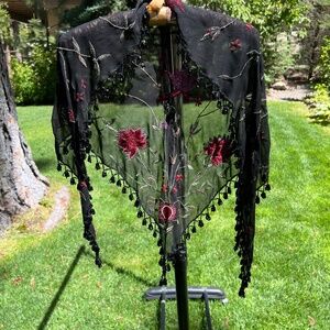 Sheer black shaw flower design and beading.